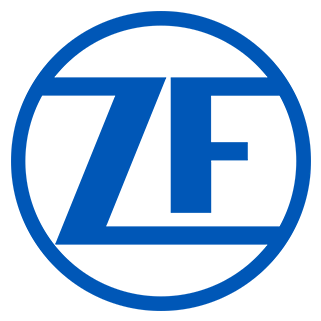 ZF-Logo mit blauen Großbuchstaben „ZF“ in einem blauen Kreis.